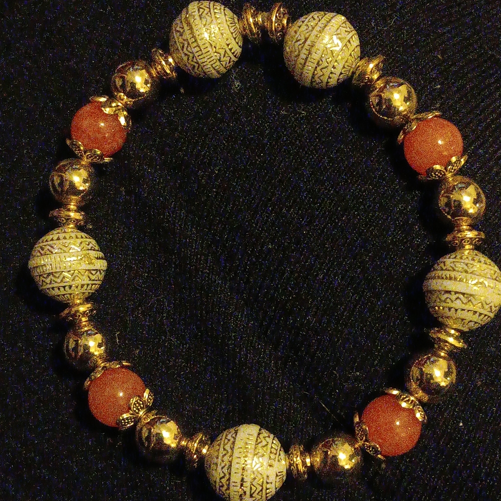 Sophisticated Gold and Orange Beaded Bracelet